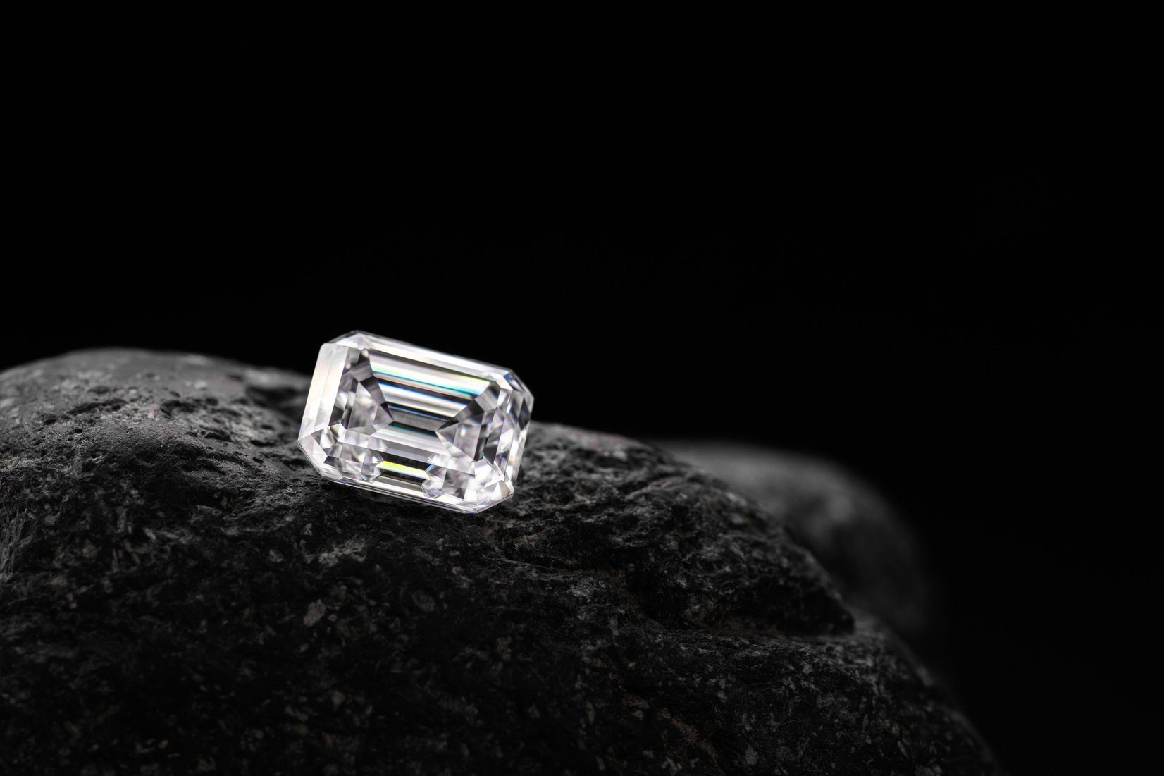 Emerald Cut Diamond on Black Stone